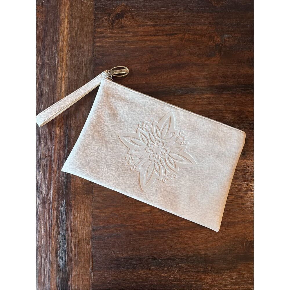White clutch by Carlos Santana